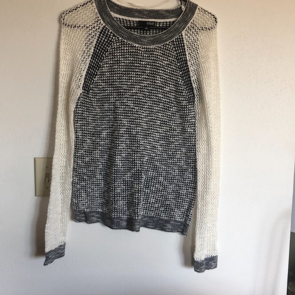 Women’s light sweater.